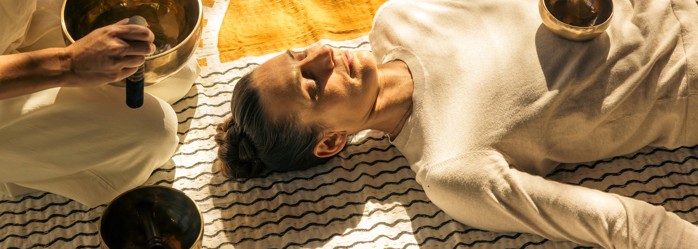 A sound-bath session at Canyon Ranch in warm desert light